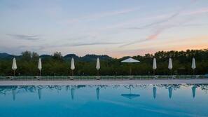 Seasonal outdoor pool, pool loungers