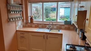 Fridge, microwave, oven, hob