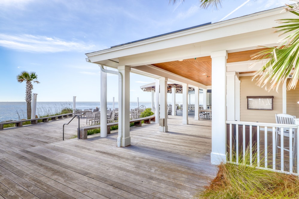 Dog-friendly, riverfront condo w/ shared pool plus access to tennis & gym