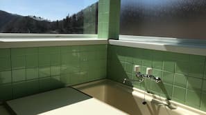 Separate tub and shower, deep soaking tub, free toiletries, hair dryer