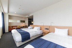 Deluxe Triple Room, Non Smoking | Desk, laptop workspace, iron/ironing board, free WiFi