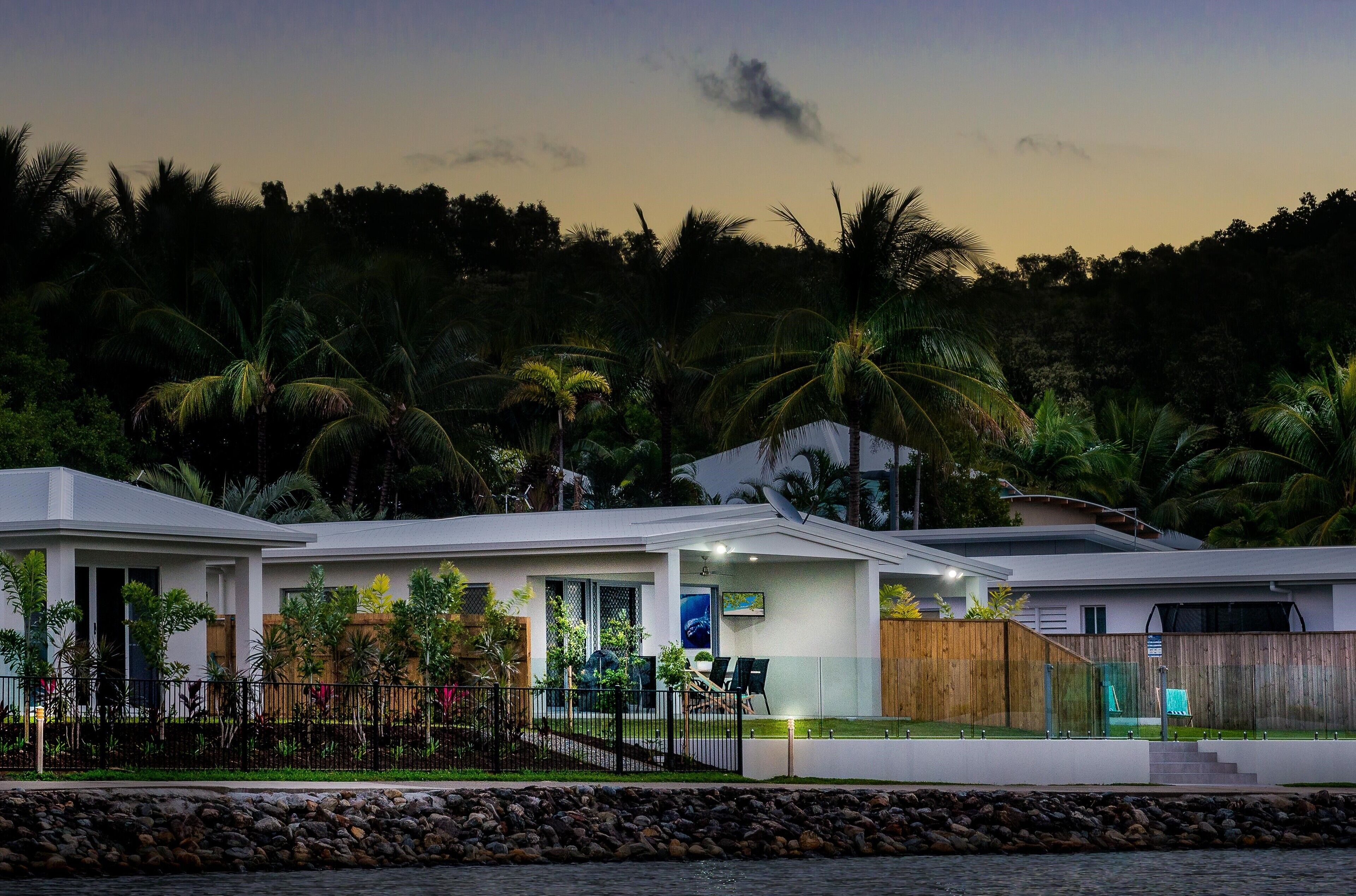 New 3 bedroom lakeside villa with tennis court and lap pool