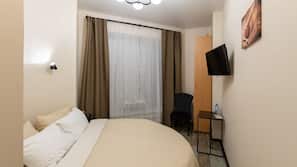 Hypo-allergenic bedding, blackout drapes, iron/ironing board, free WiFi