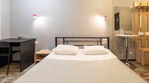 Hypo-allergenic bedding, blackout drapes, iron/ironing board, free WiFi