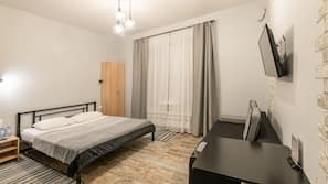Hypo-allergenic bedding, blackout drapes, iron/ironing board, free WiFi