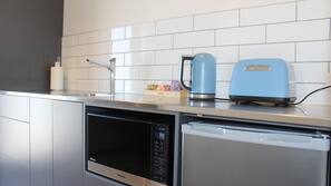 Fridge, microwave, electric kettle, toaster