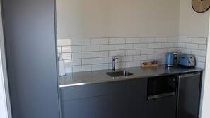 Fridge, microwave, electric kettle, toaster