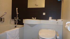 Combined shower/tub, free toiletries, slippers