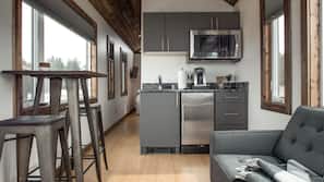 Mini-fridge, microwave, stovetop, coffee/tea maker