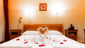 In-room safe, blackout curtains, iron/ironing board, cots/infant beds