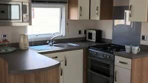 Fridge, microwave, hob, electric kettle