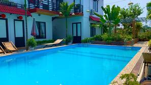 Outdoor pool, open 7:00 AM to 10:00 PM, free cabanas, sun loungers