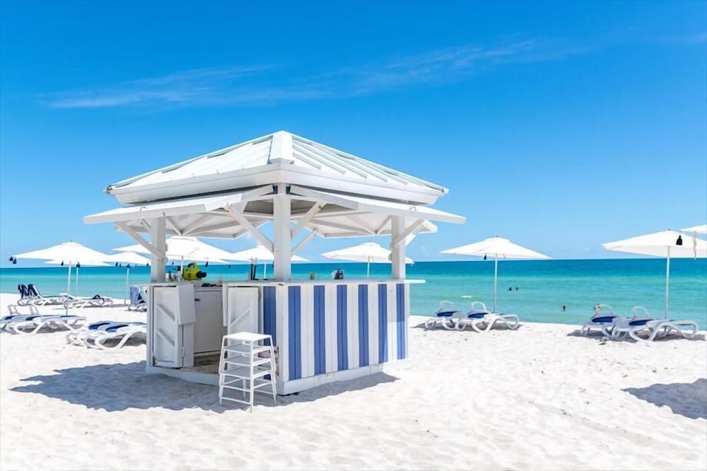 New Listing! Ocean Views on the Beach! Condo-Hotel w/Balcony | Pool w/Hot Tub and Gym | Beach Access