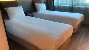 Desk, blackout drapes, iron/ironing board, free cribs/infant beds