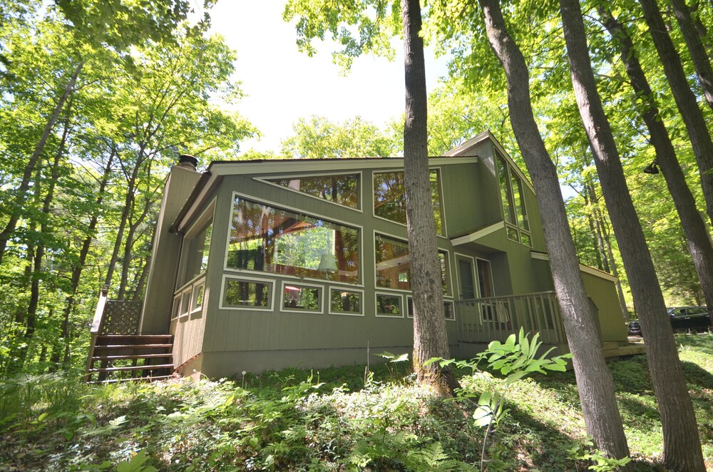 Lodgestyle multilevel home at the Homestead in Glen Arbor. Deck with