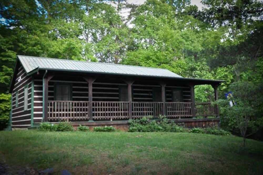 A little mountain cabin in the woods.