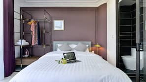 Premium bedding, down comforters, memory foam beds, free minibar items