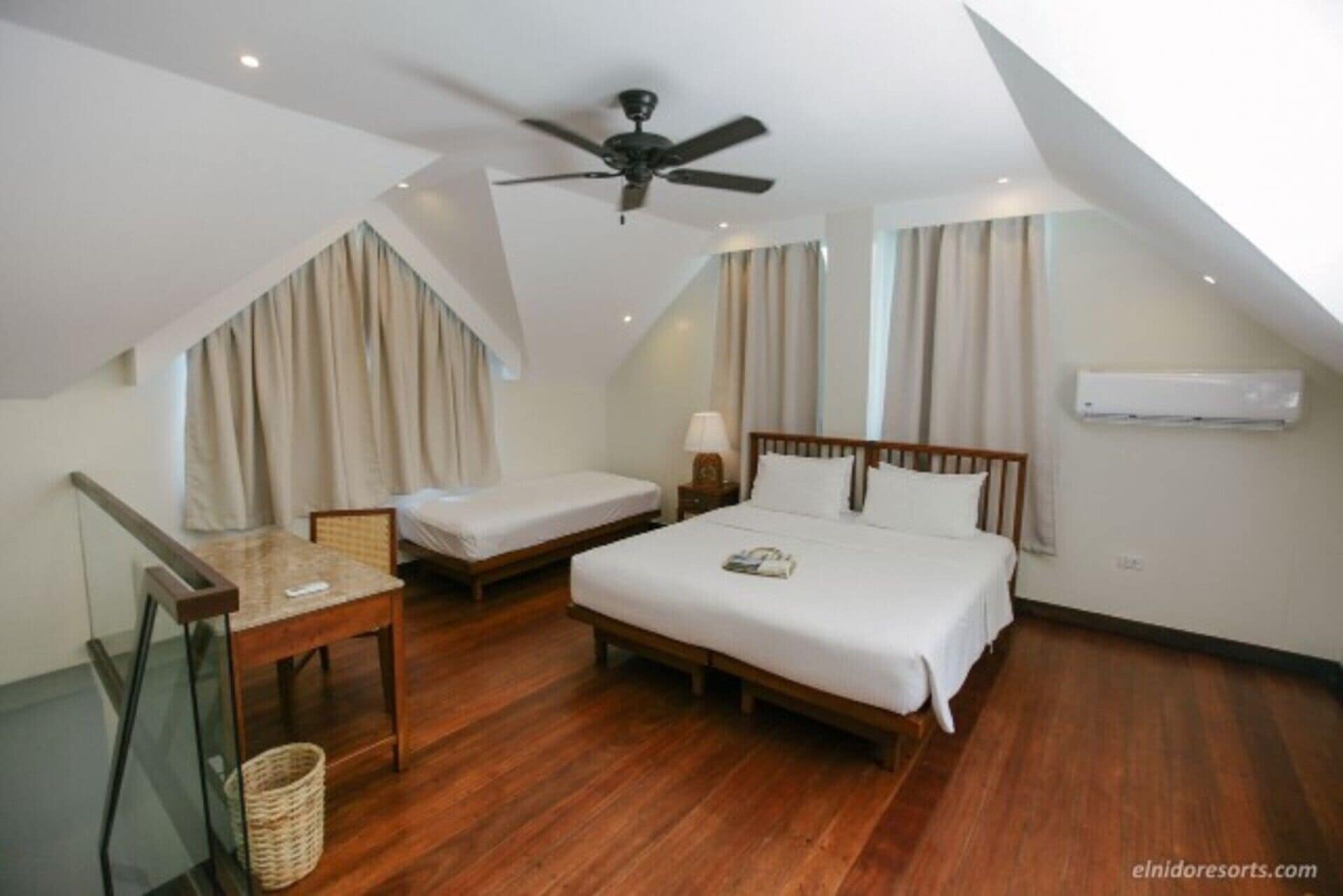 Beautiful 5 Star Loft Water Cottage with Sea Views on Apulit Island Resort, El Nido Cottage 1002 in Taytay, Philippines