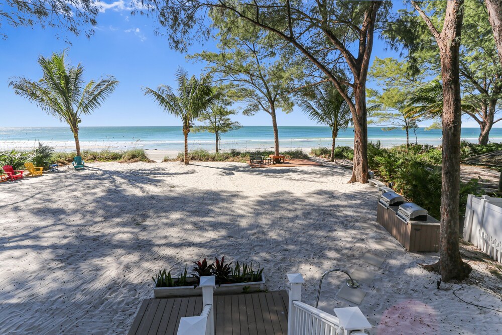 Beach Hugger 2 - Newly remodeled, charming beach front bungalow!