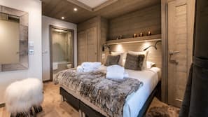 4 chambres, coffre-forts dans les chambres, fer et planche à repasser