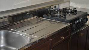 Fridge, microwave, cookware/dishes/utensils