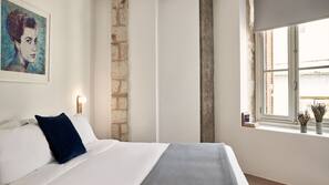 Premium bedding, free minibar items, in-room safe