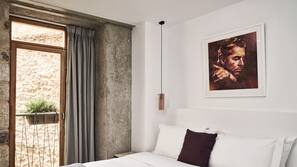 Premium bedding, free minibar items, in-room safe