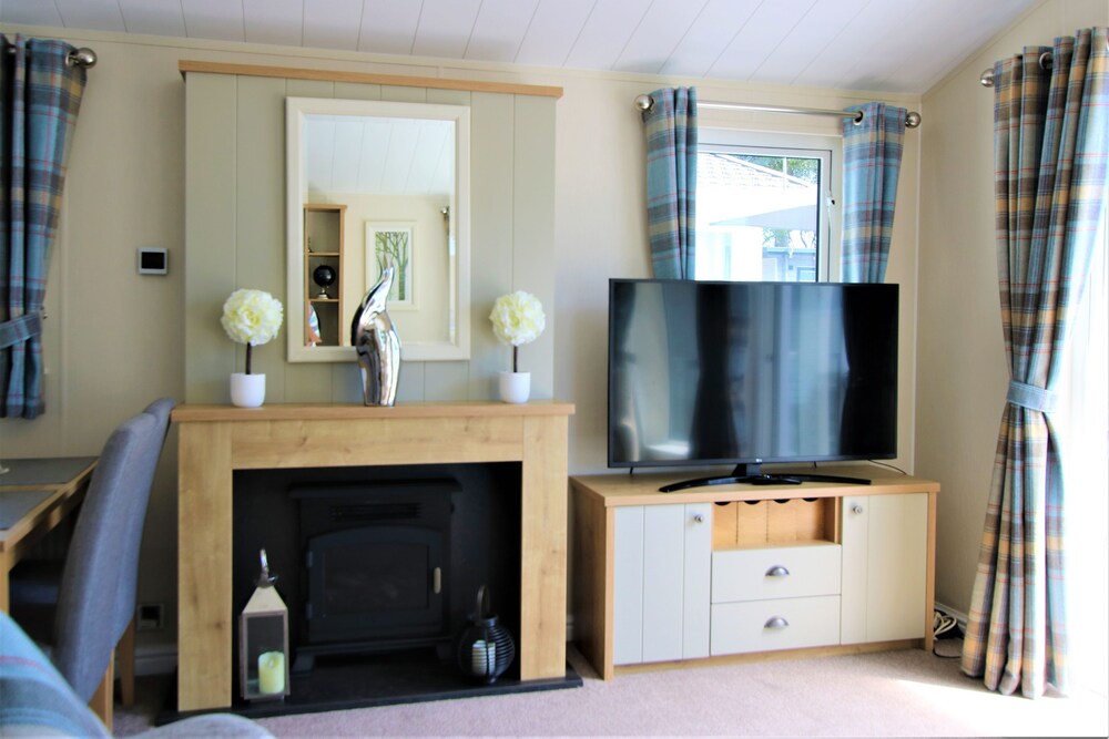 'Heathfield', A luxury lodge on the Sandhills Holiday Park Mudeford