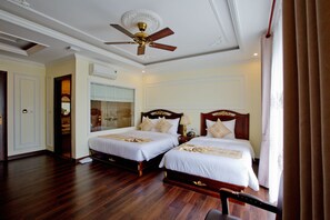Deluxe Triple Room, River View | Premium bedding, memory foam beds, minibar, desk