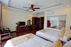 Deluxe Triple Room, River View | Premium bedding, memory foam beds, minibar, desk