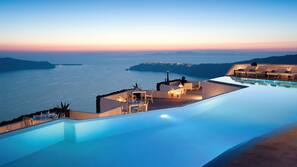 Outdoor pool, open 8:00 AM to 7:00 PM, pool umbrellas, pool loungers