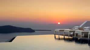 Outdoor pool, open 8:00 AM to 7:00 PM, pool umbrellas, pool loungers