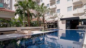 Seasonal outdoor pool, open 10:00 AM to 8:00 PM, free pool cabanas