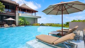 3 outdoor pools, open 7:00 AM to 7:00 PM, pool umbrellas, sun loungers
