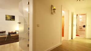 Flat-screen TV, video game console, DVD player, first-run films