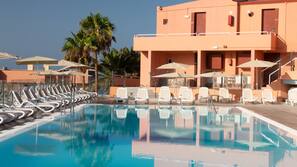 2 outdoor pools, pool umbrellas, sun loungers