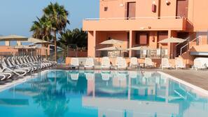 2 outdoor pools, pool umbrellas, sun loungers