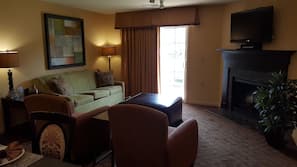 40-inch flat-screen TV with cable channels, TV, fireplace