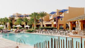 Outdoor pool, pool umbrellas, pool loungers