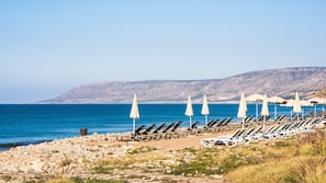 Private beach, sun-loungers, beach umbrellas, beach towels