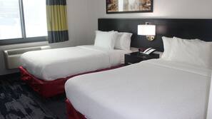 Hypo-allergenic bedding, down duvet, pillow top beds, in-room safe