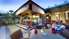 Outdoor pool, open 7:00 AM to 10:00 PM, pool umbrellas, pool loungers
