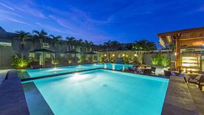 Outdoor pool, open 7:00 AM to 10:00 PM, pool umbrellas, pool loungers