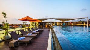 Outdoor pool, pool umbrellas, pool loungers