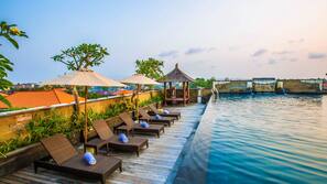 Outdoor pool, pool umbrellas, pool loungers