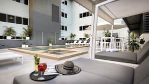 Outdoor pool, pool umbrellas, sun loungers