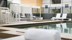 Outdoor pool, pool umbrellas, sun loungers