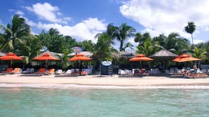 On the beach, white sand, free beach cabanas, sun-loungers