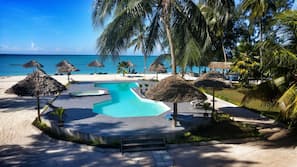 Private beach, white sand, sun-loungers, beach umbrellas