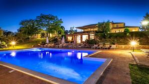 Seasonal outdoor pool, pool loungers
